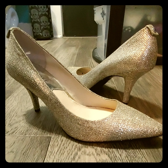 Michael Kors Shoes - Size 8 Michael Kors gold heels